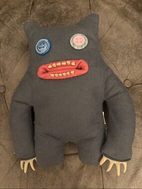 Gray Monster Plush Toy with Red Mouth and Button Eyes